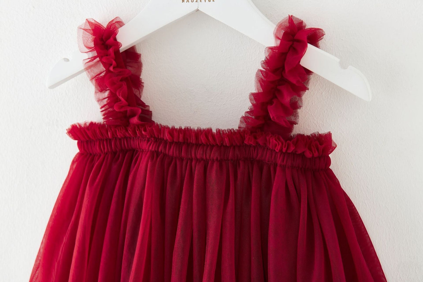 Vestido en tonos de rojo